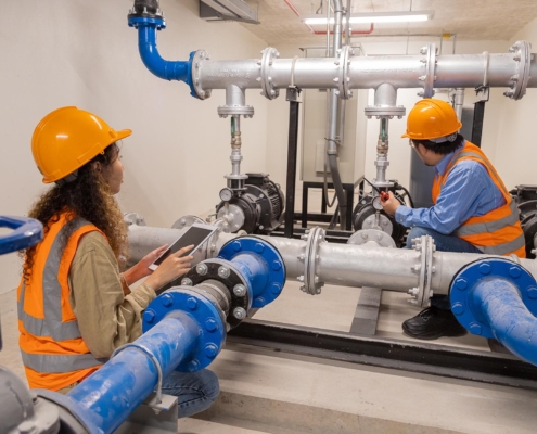 Two workers inspecting Cooling Tower